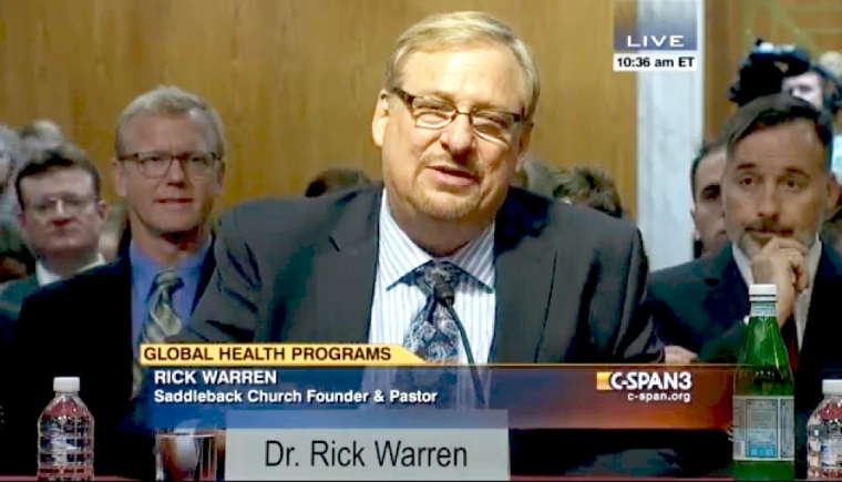 Pastor Rick Warren testifying at a congressional hearing
