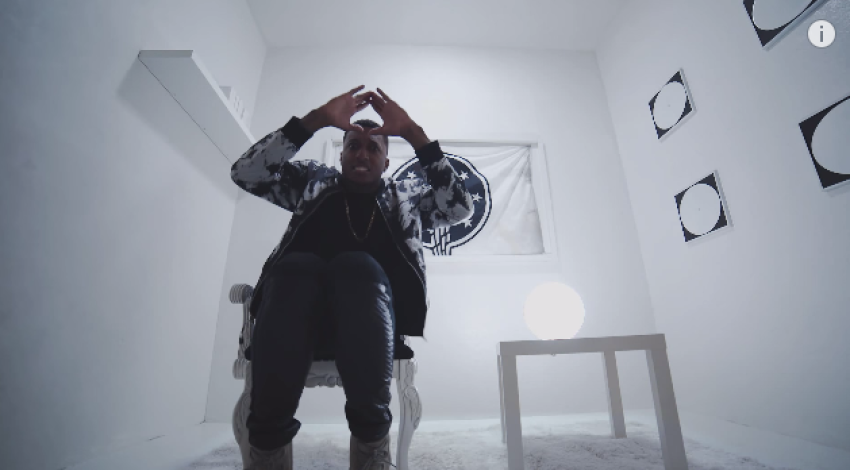 Christian rapper Lecrae makes triangular hand gesture in KB's 