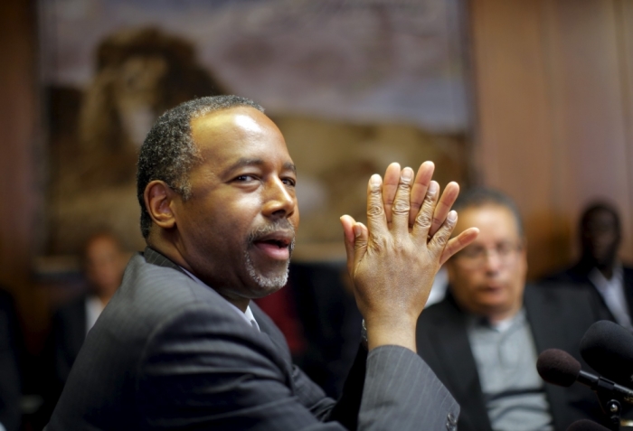 Republican presidential candidate Dr. Ben Carson talks to pastors and community leaders during a meeting at the Bilingual Church in Baltimore, Maryland, May 7, 2015.