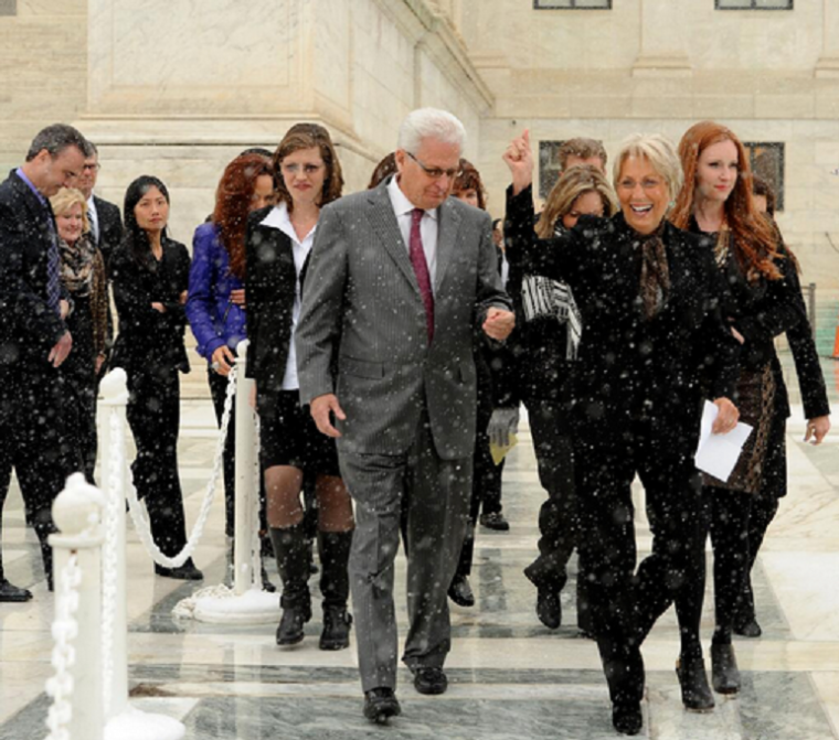 Hobby Lobby founders Barbara Green and her husband David Green exit the U.S. Supreme Court in Washington, D.C. on March 25, 2014.