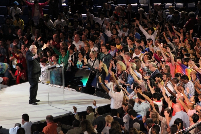 Dr. George O. Wood, chairman of the Assemblies of God Church, prays with Spirit-filled participants at the opening night of the Empowered21 Congress in Jerusalem, Israel, on May 20, 2015.