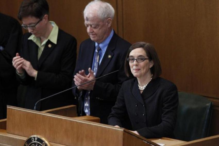 Oregon Gov. Kate Brown speaks after being sworn in at the state capital building in Salem, Oregon on February 18, 2015.