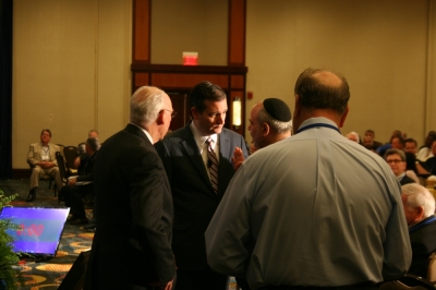 Sen. Ted Cruz, R-Texas, speaking with an attendee after his speech at the Watchmen on the Wall conference hosted by Family Research Council, Washington, D.C., May 21, 2015.