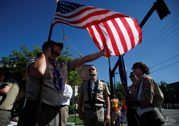 Members of the Boys Scouts of America prepare to march in a gay pride parade in Salt Lake City, Utah, June 2, 2013. Both Mormons and members of the Boy Scouts marched with members of LGBT community and their supporters as part of the Utah Pride Festival.