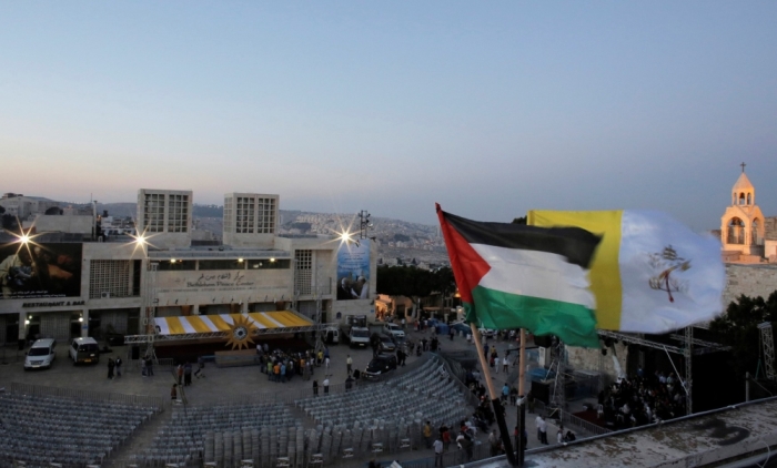 A general view of Manger Square as workers prepare for the visit of Pope Francis to the West Bank town of Bethlehem, May 23, 2014. Pope Francis will visit Jordan, the Palestinian Territories and Israel during his May 24-26 trip, his first as pope to the region.
