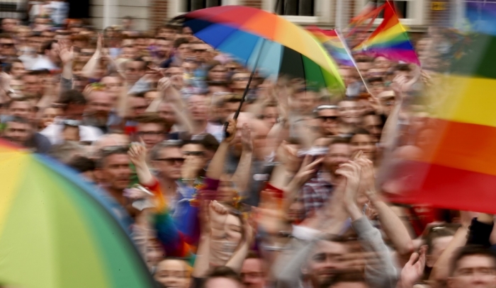People react as Ireland voted in favor of allowing same-sex marriage in a historic referendum, in Dublin, May 23, 2015. Ireland became the first country in the world to adopt same-sex marriage by popular vote as 62 percent of the electorate backed a referendum, official results showed on Saturday.
