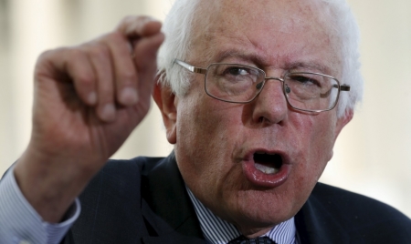 Presidential hopeful Senator Bernie Sanders (I-Vt.) holds a news conference to discuss legislation "to provide tuition-free higher education for students at 4-year colleges and universities in the United States" at the U.S. Capitol in Washington, May 19, 2015.