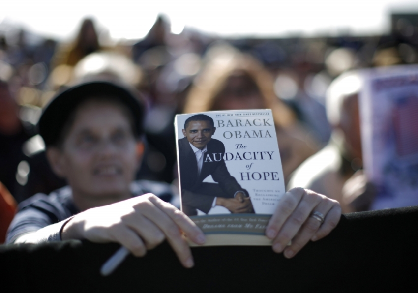 A supporter of U.S. Democratic presidential nominee Senator Barack Obama, D-Ill., waits for Obama to sign her copy of his book, "The Audacity of Hope," during a campaign rally at Peccole Stadium in the University of Nevada in Reno, October 25, 2008.
