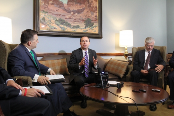 Sen. Mike Lee, R-Utah, (C) discusses the ramifications of the U.S. Supreme Court potentially ruling in favor of making same-sex marriage a constitutional right in June. Also pictured are Keith Wiebe, president of the American Association of Christian Colleges, (R) and Jerry Johnson, president of the National Religious Broadcasters (L).
