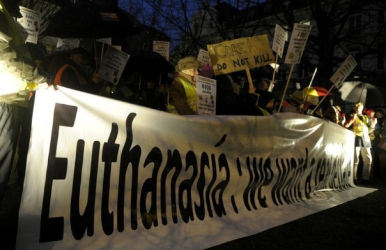 Protesters demonstrate against a new law authorizing euthanasia for children, in Brussels February 11, 2014.