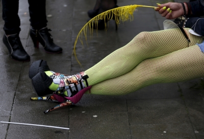 A participant rests during the Belgian lesbian, gay, bisexual and transgender (LGBT) Pride Parade in Brussels, Belgium, May 16, 2015.