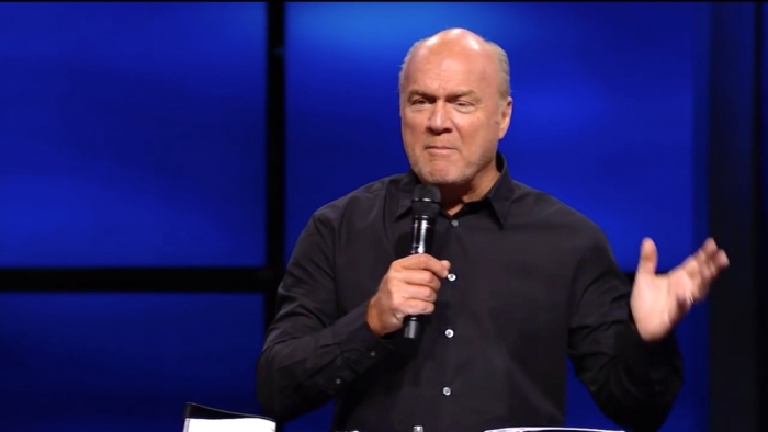 Pastor Greg Laurie speaking to his congregation about future event