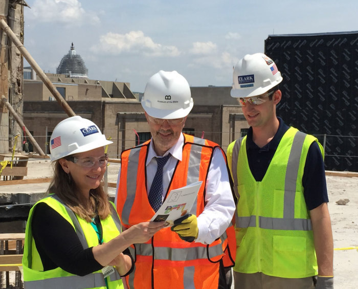 (l-r) Shannon Bennett, Director of Community Relations of Museum of the Bible; Paul de Vries, and Adam Byrd, a manager for Clark Construction during the hard-hat tour of the construction site of the Museum of the Bible in Washington, D.C.