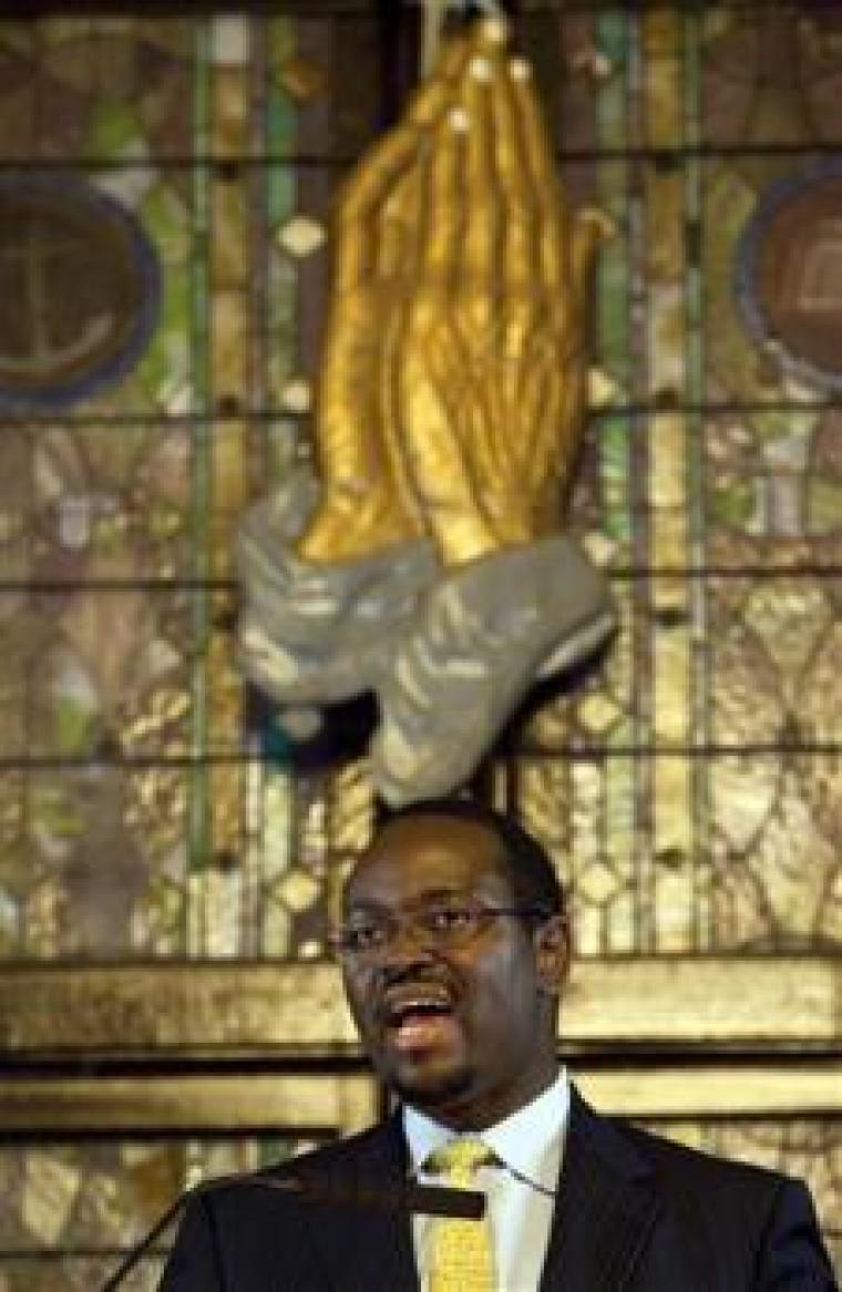 The Rev. Clementa Pinckney speaks to those gathered during the Watch Night service at Emanuel African Methodist Episcopal Church in Charleston, South Carolina, December 31, 2012. New Year's Day 2013 was the 150th anniversary of President Abraham Lincoln's Emancipation Proclamation, which declared free all slaves in the rebellious states of the Civil War.The Watch Night tradition at black churches goes back to 'Freedom's Eve,' on New Year's Eve 1862 when slaves, free blacks and abolitionists gathered in churches and homes to wait for the Emancipation Proclamation to take effect on January 1, 1863.