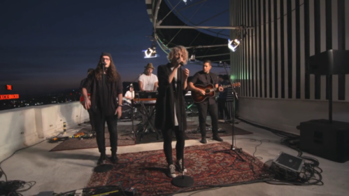 Hillsong United performs at the top of the Capitol Records tower in Los Angeles, California.