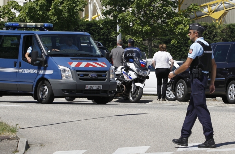 A French Gendarme blocks the access road to the Saint-Quentin-Fallavier industrial area, near Lyon, France, June 26, 2015. Unknown persons rammed a car into the premises of a U.S. gas company in southeast France on Friday, exploding gas containers in an apparent attack which bore the hallmarks of Islamist militants and left one dead and several wounded, police sources and French media said.