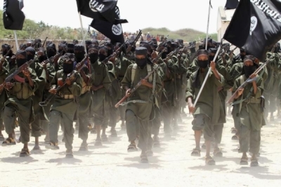 New recruits belonging to Somalia's al-Qaeda-linked al Shabaab rebel group march during a passing out parade at a military training base in Afgoye, west of the capital Mogadishu February 17, 2011.