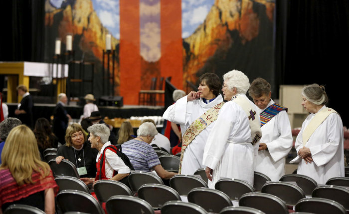 A group of deacons arrive for a church service during the General Convention of the Episcopal Church in Salt Lake City, Utah June 28, 2015. The General Convention of the Episcopal Church is held every three years in different cities around the country.
