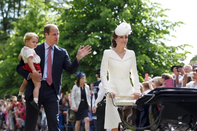 The Duke and Duchess of Cambridge walk past the crowds at the Church of St Mary Magdalene on the Sandringham Estate with their son Prince George and daughter Princess Charlotte, after her christening, July 5, 2015.