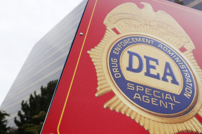 A sign with a DEA badge marks the entrance to the U.S. Drug Enforcement Administration Museum in Arlington, Virginia.
