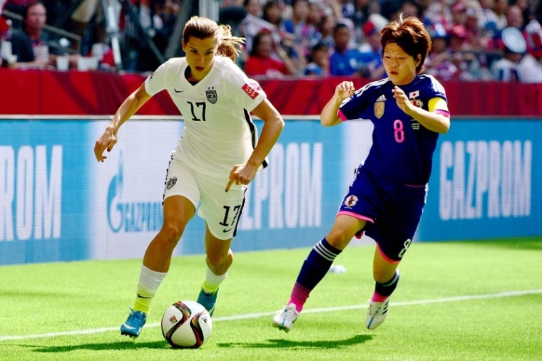 United States midfielder Tobin Heath (17) drives the ball against Japan midfielder Aya Miyama (8) in the first half of the final of the FIFA 2015 Women's World Cup at BC Place Stadium in Vancouver, British Columbia, Canada, on July 5, 2015.