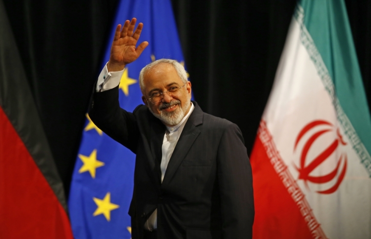 Iranian Foreign Minister Mohammad Javad Zarif waves after a plenary session at the United Nations building in Vienna, Austria, July 14, 2015. Iran and six major world powers reached a nuclear deal on Tuesday, capping more than a decade of on-off negotiations with an agreement that could potentially transform the Middle East, and which Israel called an 'historic surrender.'