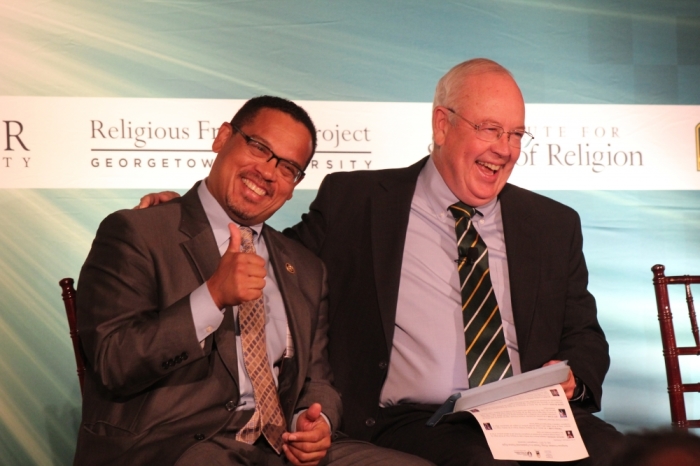 U.S. Rep. Keith Ellison (L) and Baylor University Chancellor Ken Starr (R) participate in a discussion on international religious freedom at Georgetown University in Washington on July 16, 2015.