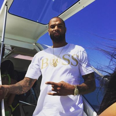 Houston-based Rapper Slim Thug poses aboard a boat.