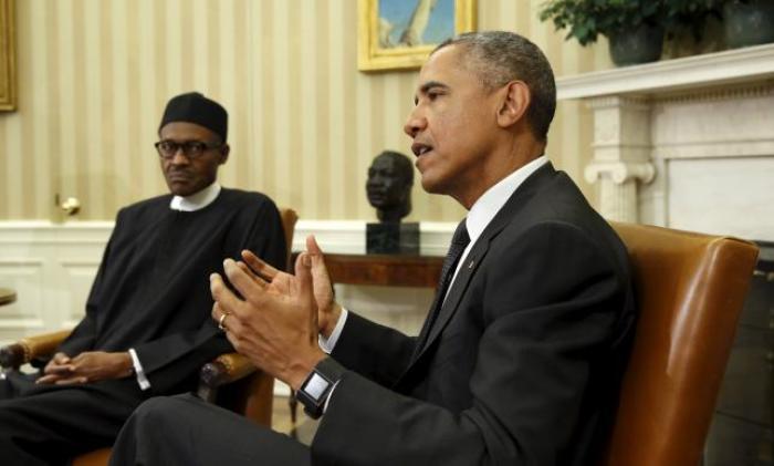U.S. President Barack Obama meets with Nigerian President Muhammadu Buhari (L) in the Oval Office of the White House in Washington July 20, 2015.