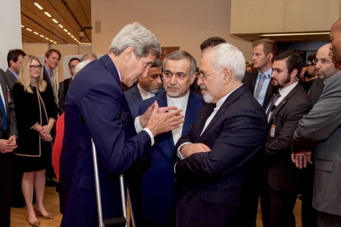 U.S. Secretary of State John Kerry (L) speaks with Hossein Fereydoun (C), the brother of Iranian President Hassan Rouhani, and Iranian Foreign Minister Javad Zarif (R), before the Secretary and Foreign Minister addressed an international press corps gathered at the Austria Center in Vienna, Austria, July 14, 2015. Iran and six major world powers reached a nuclear deal on Tuesday, capping more than a decade of on-off negotiations with an agreement that could potentially transform the Middle East, and which Israel called an 'historic surrender.'