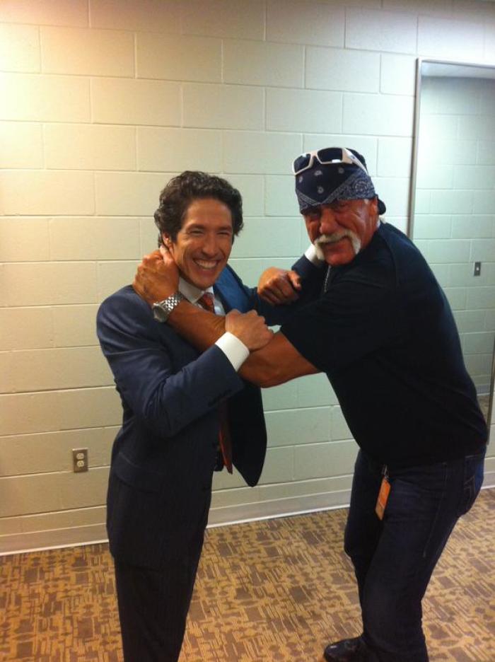 Hulk Hogan poses with Lakewood Church pastor Joel Osteen.