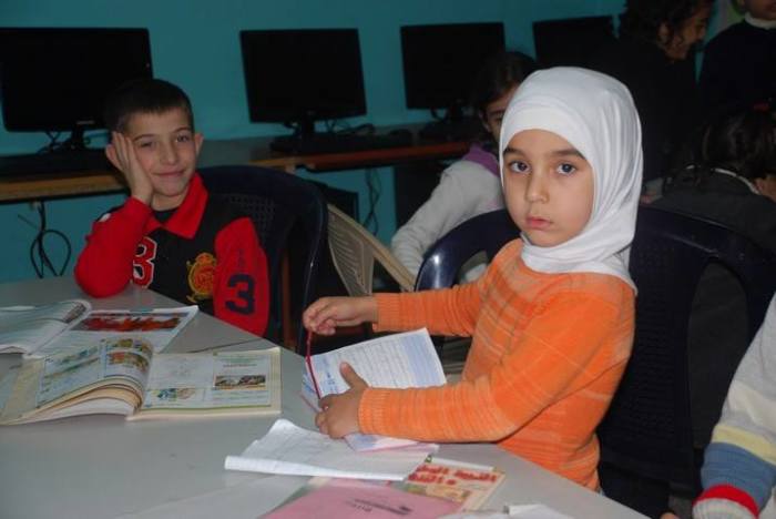 Young refugees attend classes at the Life Center in Beirut, Lebanon. According to World Vision, around 1.6 Million Syrian refugees are children.