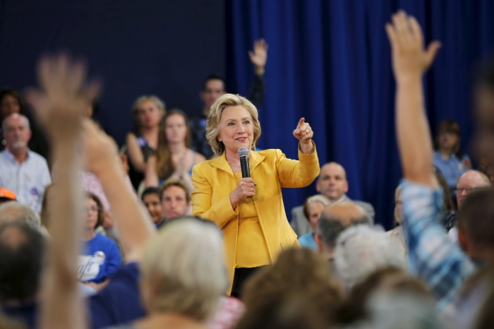 Democratic presidential candidate Hillary Clinton takes a question from the audience during a town hall campaign stop in Nashua, New Hampshire, July 28, 2015.