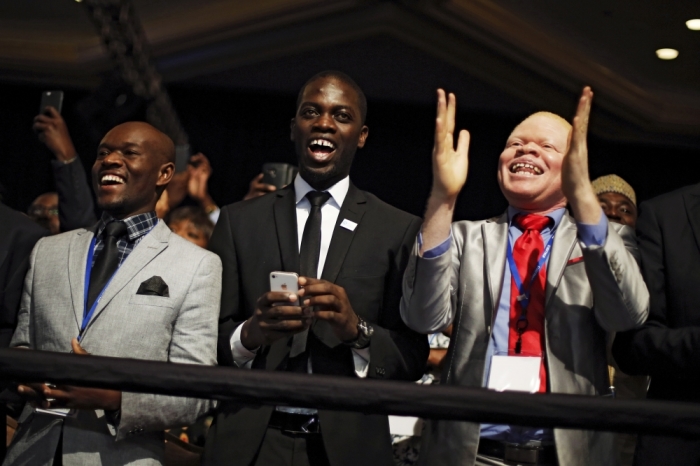 Attendees applaud U.S. President Barack Obama (not pictured) takes the stage for remarks at the Young African Leaders Initiative Mandela Washington Fellowship Presidential Summit in Washington, August 3, 2015.