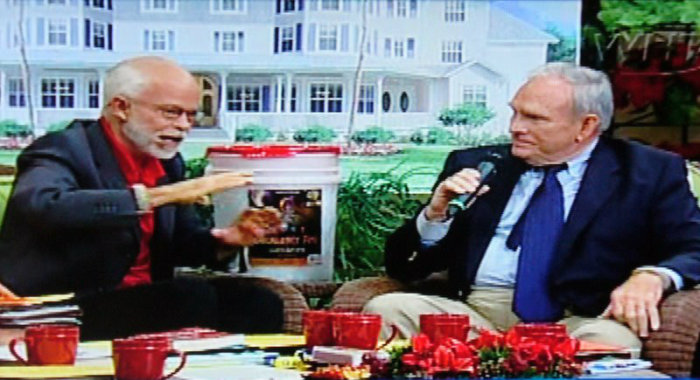 Larry Bates, indicted for mail and wire fraud, appears in this video image of a 2011 appearance on 'The Jim Bakker Show.'