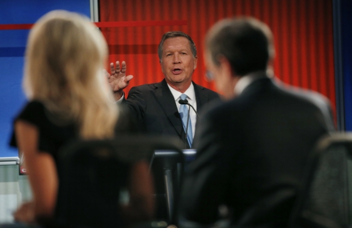 Republican 2016 U.S. presidential candidate and Ohio Governor John Kasich answers a question at the first official Republican presidential candidates debate of the 2016 U.S. presidential campaign in Cleveland, Ohio, August 6, 2015.