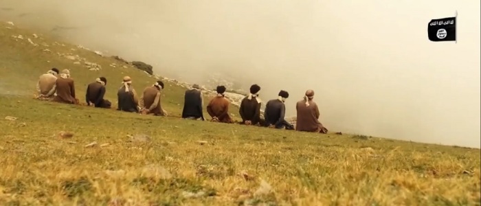 Afghan victims are forced to kneel where the bombs have been secretly hidden by the ISIS militants in footage released in August, 2015.