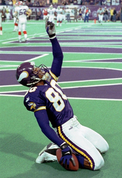 Minnesota Vikings receiver Chris Carter (80) celebrates a third quarter touchdown at the Metrodome in Minneapolis, October 22, 2000. The Vikings beat the Buffalo Bills 31-27, to remain the league's only undefeated team.