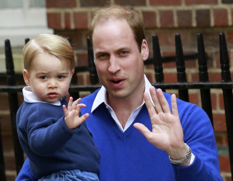 Britain's Prince William returns with his son George to the Lindo Wing of St Mary's Hospital, after the birth of his daughter in London, Britain, May 2, 2015.