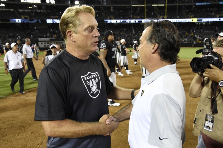 Oakland Raiders head coach Jack Del Rio (L) shakes hands with St. Louis Rams head coach Jeff Fisher (R) after a preseason NFL football game at O.co Coliseum. The Raiders defeated the Rams 18-3, Oakland, California, August 14, 2015.