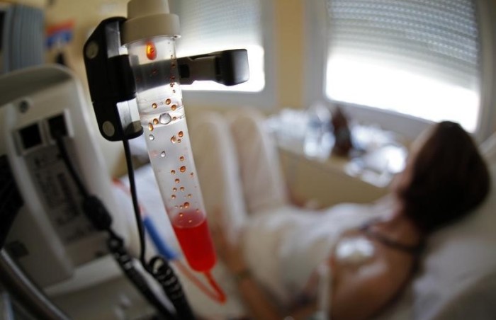 A patient receives chemotherapy treatment for breast cancer at the Antoine-Lacassagne Cancer Center in Nice July 26, 2012.