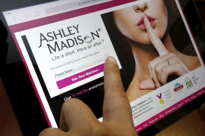 The homepage of the Ashley Madison website is displayed on an iPad, in this photo illustration taken in Ottawa, Canada, July 21, 2015.