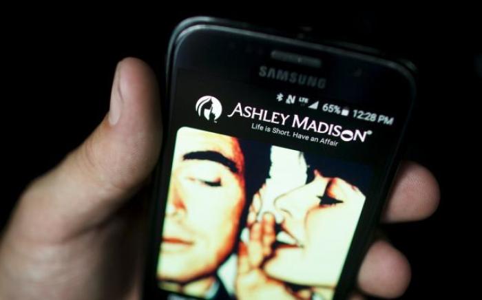 A photo illustration shows the Ashley Madison app displayed on a smartphone in Toronto, August 20, 2015.