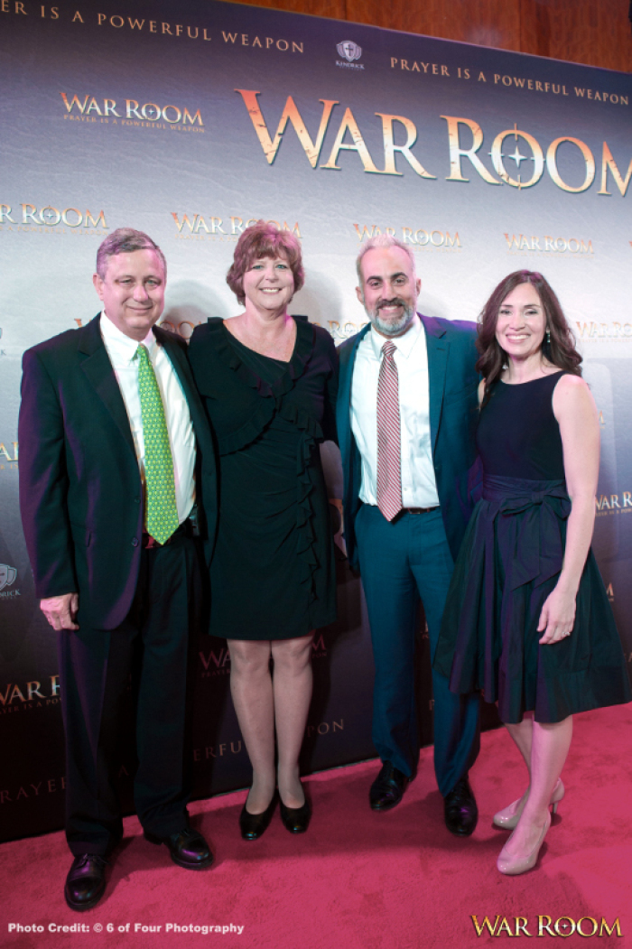 'War Room' Co-writer/Producer Stephen Kendrick poses with guests at the film's red carpet premier in Atlanta, Georgia, August 20, 2015.
