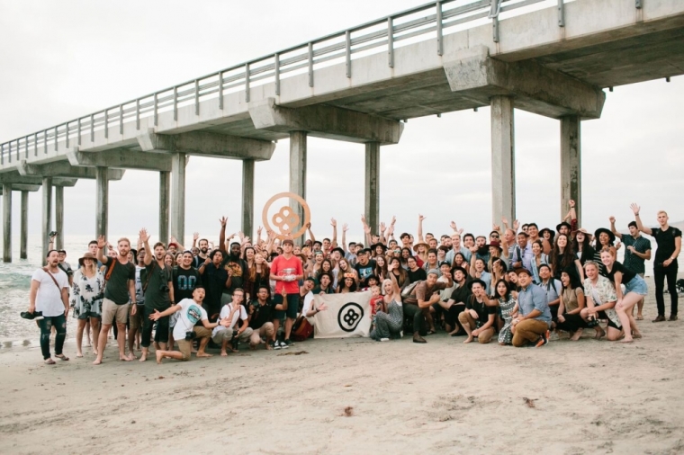 Socality Live San Diego: a large group gathers for a beach photo. Socality was described by its founder, Scott Bakken, as a 'movement' and a “new form of evangelism' during an interview with The Christian Post on August 28, 2015.