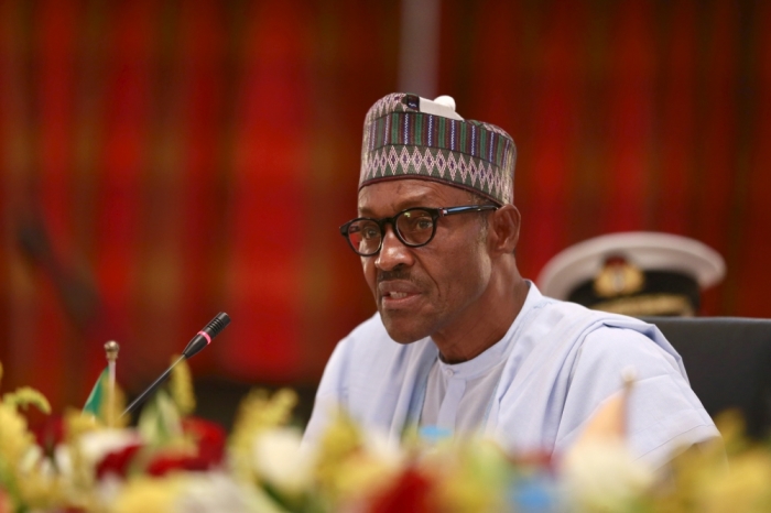 Nigeria's President Muhammadu Buhari speaks during the opening ceremony for the Summit of Heads of State and Governments of the Lake Chad Basin Commission (LCBC) at the presidential wing of the Nnamdi Azikiwe International Airport Abuja, Nigeria, June 11, 2015. 