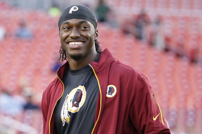 Washington Redskins quarterback Robert Griffin III (10) looks on prior to the game against the Jacksonville Jaguars at FedEx Field in Landover, Maryland, September 3, 2015.