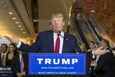 U.S. presidential hopeful Donald Trump speaks during a press availability after signing a pledge with the Republican National Committee (RNC) at Trump Tower in Manhattan, New York September 3, 2015. Trump on Thursday bowed to pressure from the party establishment and signed a pledge not to run as an independent candidate in the November 2016 presidential election.