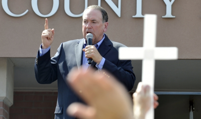 Republic presidential candidate Mike Huckabee speaks at a rally for Kim Davis, the Kentucky county clerk in Grayson, Kentucky September 8, 2015. U.S. District Judge David Bunning ordered Davis' release after six days in jail, saying she 'shall not interfere in any way, directly or indirectly, with the efforts of her deputy clerks to issue marriage licenses to all legally eligible couples.'