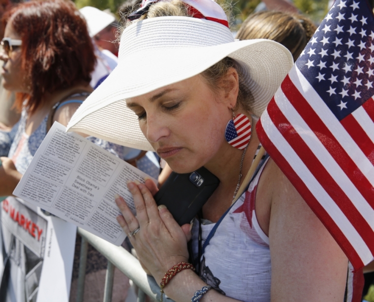 An activist gathers at a Capitol Hill rally to 'Stop the Iran Nuclear Deal' in Washington, September 9, 2015.